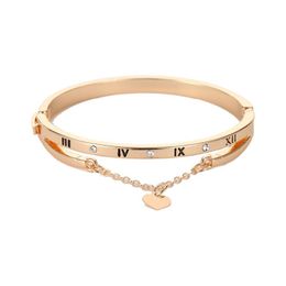 Rose Gold Stainless Steel Bracelets Bangles with a Heart-Shaped Forever Love Brand Charm, a Popular Piece of Jewelry.