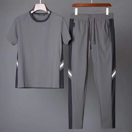Men's Tracksuits Arrival Men's Cool and Thin Short Sleeve T-shirtPant Two-Piece Set Solid ShirtTrousers Home Suits Male Size M-5XL 956 230422