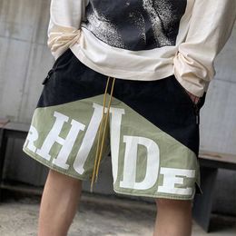 Designer Clothing Rhude Dual Colour Panel Drawstring Shorts Letter Printed Casual Capris Beach Pants Trendy Men Couples Joggers Sportswear Beach fitness