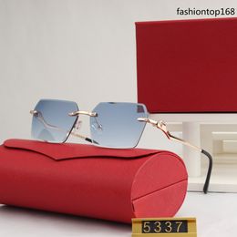 New Rimless luxury UV400 lens sunglasses for women or men Unisex rimless designer outdoor casual driving glasses