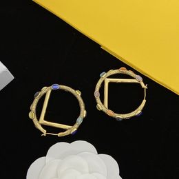 Shiny diamond hoop earrings, crystal earrings, gold and silver earrings, interlocking letter earrings
