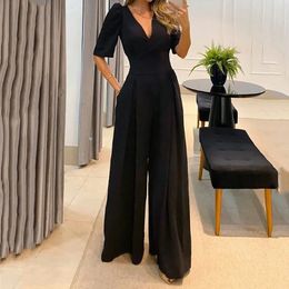 Women's Jumpsuits Rompers LIYONG Women Jumpsuit Puff Short Sleeve V Neck Backless Nipped Waist Loose Wide Legs Casual Pants Romper High Streetwear 230422