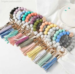 14 Colors Wooden Tassel Bead String Bracelet Keychain Food Grade Silicone Beads Bracelets Women Girl Key Ring Wrist Strap db961 OJ6X