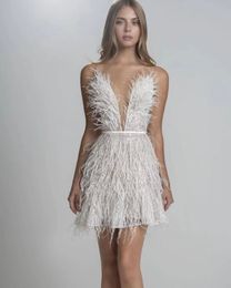 2023 autumn and winter, the new European and n women's sexy backless party dress, waist-down, deep v-feather sling dress