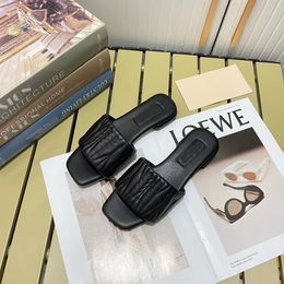 Early summer new M buckle letter flat slippers market wear with imported over migrating leather pads sheepskin 35-41