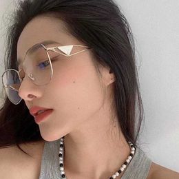 Fashion Pradd cool sunglasses designer P's new inverted triangle 57 y same polygon UV resistant hollow out leg