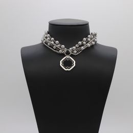 Pendant Necklaces Retro multi-layer pearl rhinestone design with a sense of niche heavy industry, high-quality women's necklace