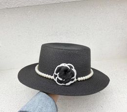 French Paris fashion show flower flat top hat summer light luxury fine grass braided sunscreen sun hat female