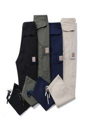Men039s PantsOversized mens pants Carhart designer Pants Casual loose overalls Multi functional trousers Pocket sweatpants 803ESS
