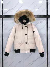 Piumino da uomo di design Giacca invernale Piumino da donna Parka bianco anatra antivento con colletto parker caldo vera pelliccia di lupo Giubbotto bomber elegante Cappotto da avventura