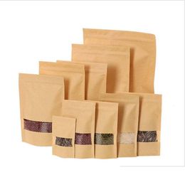 Packing Bags Wholesale Brown Kraft Paper Clear Window Zipper Retail Mylar Stand Up Pouch For Snack Candy Coffee Bean Powder Christmas Dhfmo