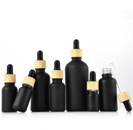 Matte Black Glass e liquid Essential Oil Perfume Bottle with Reagent Dropper and Wood Grain Cap Packing Bottles