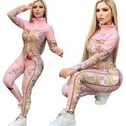 Pantaloni a due pezzi Tuta rosa Giacca da donna con cerniera stampata casual e pantaloni della tuta Set spedizione gratuita