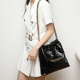 Xiangnanma Garbage 2022 Autumn and Winter New Real Cowhide Chain Personalised Letter Water Bucket Light Luxury Bag wholesale handbags 30 dollars