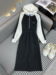 New fashion hooded dress/black and white contrasting design/back middle letter print decoration/triangle embellishment/exquisite workmanship/