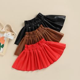 Skirts Fashion Summer Toddler Baby Girl Mini Skirt Casual Elastic Waist Solid Colour Faux Leather Pleated Skirt Kid Clothing 230427