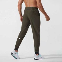 Lulus Pantaloni da uomo Pantaloni da yoga Sport Quick Dry con coulisse Tasche da palestra Pantaloni sportivi Pantaloni da uomo Casual elastico in vita Tkwe