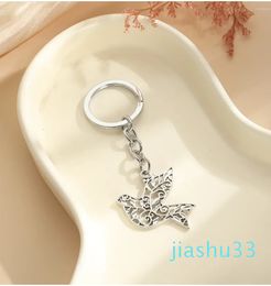 Keychains 20pcs Hollow Peace Charm Keychain