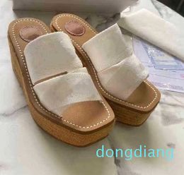 Slippers for women in summer wear fashion versatile thick soled sandals with crossed letters and straw muffin soles