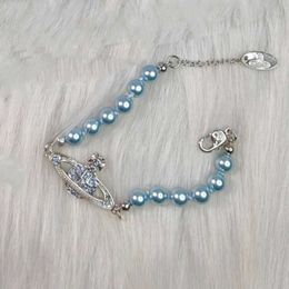 Designer Viviane Westwood New Viviane New Western Empress Dowager Blue Saturn Pearl Necklace Bracelet Earrings Personalised Simple Blue Diamond Compl