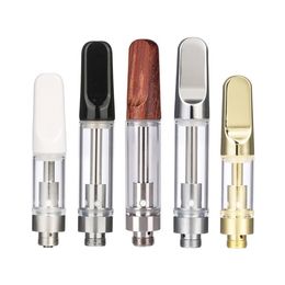 TH205 Cartucce Vape dorate 0,5 ml 1,0 ml Atomizzatori per serbatoi in vetro Punte a goccia in legno argento oro 510 Filo olio denso Bobina in ceramica Carrelli per vapori Tappo a vite confezionato in schiuma