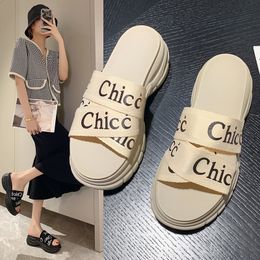 Thick-soled Slippers Female 2023 Spring New Fashion Letter One Word Elastic Height Slippers Outside To Wear