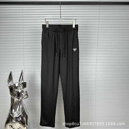 Pantaloni da uomo Versione alta P famiglia triangolo distintivo micro etichetta tinta unita pantaloni gamba dritta a righe arancione ghiaccio casual coppia allentata PXRD