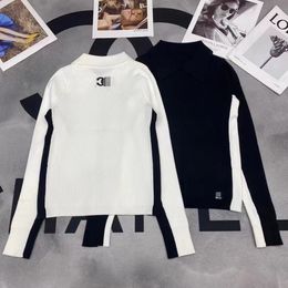 Women's New Spring and Autumn Black and White Colour Blocking Slim Flip Collar Bottom Pullover Sweater