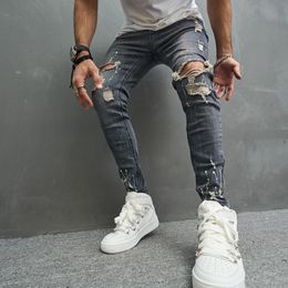Jeans skinny da uomo Pantaloni denim da motociclista slim casual alla moda con foro per il ginocchio hiphop strappato lavato invecchiato