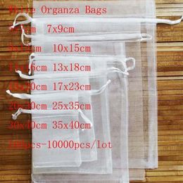 Whole 100 Pcs lot White Drawstring Organza Bags&small Pouches Jewellery Package Bags Christmas Wedding Packaging Gift Bags1206O
