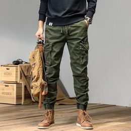 Men's Pants Spring and autumn trendy Cargo pants for men slim leggings ruffian and handsome trousers American multi bag pants outdoor v 231129