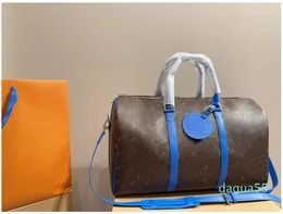 Hot designer duffle Men and women fashion travel classic Large capacity handbag Classic printed coated canvas leather travel boarding