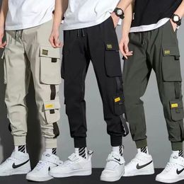 Men's Pants Thin Streetwear Casual Pants Men Ribbons Harem Jogging Pants Male Slim Fit Spring Cargo Pants Multi-Pockets Women Trouser Jx1 231129