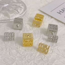 Desginer miui Unique Three-dimensional Block Letter Earrings of the Mujia Family Front and Back Letter Earrings Light and High-end Hollowed Out Temperament Earrings