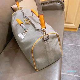 Laser Hand Luggage Travel Bag Waterproof Duffel Men Handbag Tote Boys Style Unisex Women High Quality Package Backpacks Duffle Bag285r