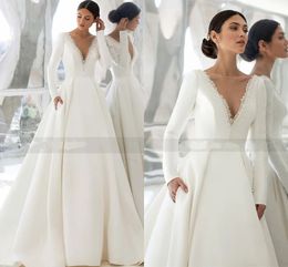 Elegant Satin Wedding Dress Long Sleeve Princess Bride Dresses Beads Pearls V Back Court Train Wedding Gowns Church Vestido De Noiva