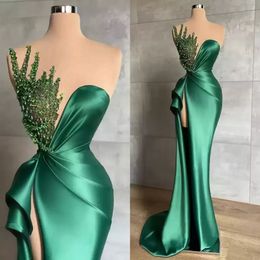Jägergrüne Meerjungfrau-Abendkleider für afrikanische Frauen, lang, sexy, seitlich hoch geschlitzt, glänzende Perlen, ärmellos, formelle Party-Illusions-Abschlussball-Partykleider