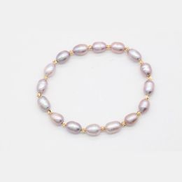 Beaded 78Mm Natural Freshwater Ctured Oval Pearl Bracelet Rice Shape Stretch Bangle Love Wish With Gold Plated Charm Drop Delivery J Dh8No