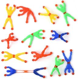 Tumblers de parede brinquedos pegajosos escalando homem de rastreador flex￭vel para crian￧as, cores de cores favores de festa de festa de p￡scoa