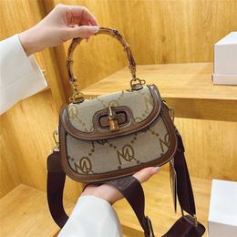 2023 Purses Clearance Outlet Online Sale Bamboo saddle new one shoulder diagonal hand fashion leisure red canvas women's bag