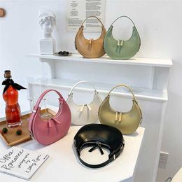 2023 Bags Clearance Outlets Korean crowdsource new semi-circular crescent metal buckle soft leather one shoulder armpit moon bag