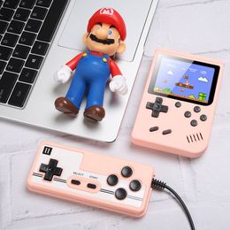 2023 Portable Macaron Handheld Double Players Game Console Player Retro Video Can Store 500 In 1 Games 8 Bit 3.0 Inch Colourful LCD Cradle With Controller
