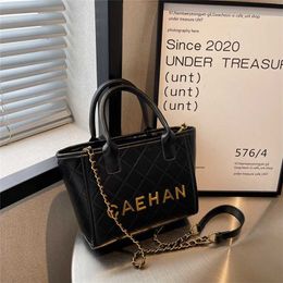 2023 Bags Clearance Outlets Advanced texture portable letter rhombus chain women's fashionable simple cross-body large capacity Tote bag