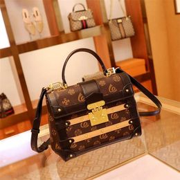 2023 Bags Clearance Outlets Women's new summer crowd lock simple small square portable women's advanced feeling single shoulder diagonal bag
