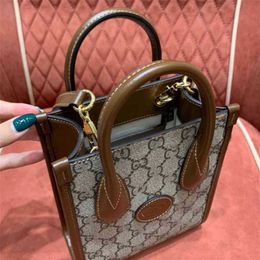 2023 Purses Clearance Outlet Online Sale Clearance Retro series interlocking double tote bag open pocket vertical square solid medium handbag