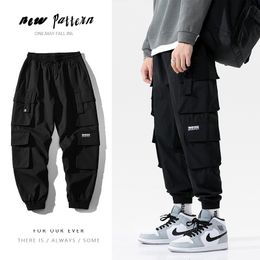 Pantaloni da uomo Streetwear Nero Mens Harem Pantaloni da uomo Cargo Hip Hop Tasche casuali Pantaloni sportivi da uomo Pantaloni oversize moda 230206