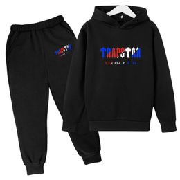 Giyim Setleri Trapstar Sportsuit Marka Baskı Çocuk Elbisesi Sporu Sıcak Renk İki Parça Gevşek Kapşonlu Pantolon Jogging Hooded Suit 230208
