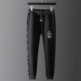 Men's Pants European luxury high-end thickened casual pants men's autumn and winter new personalized embroidered sweat handsome Y2302