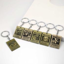 Key Rings Anime One Piece Key Chain Four Emperors Shanks Kaido Wanted Post Keyrings Holder Metal Keychains Charm Men Jewellery Wholesale G230210