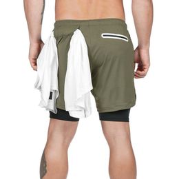 Portos cortos de deportes de gimnasio para hombres Camiseta de fitness transpirable